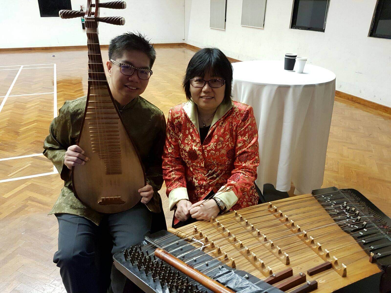 Nicholas Ng with a music student after a lesson
