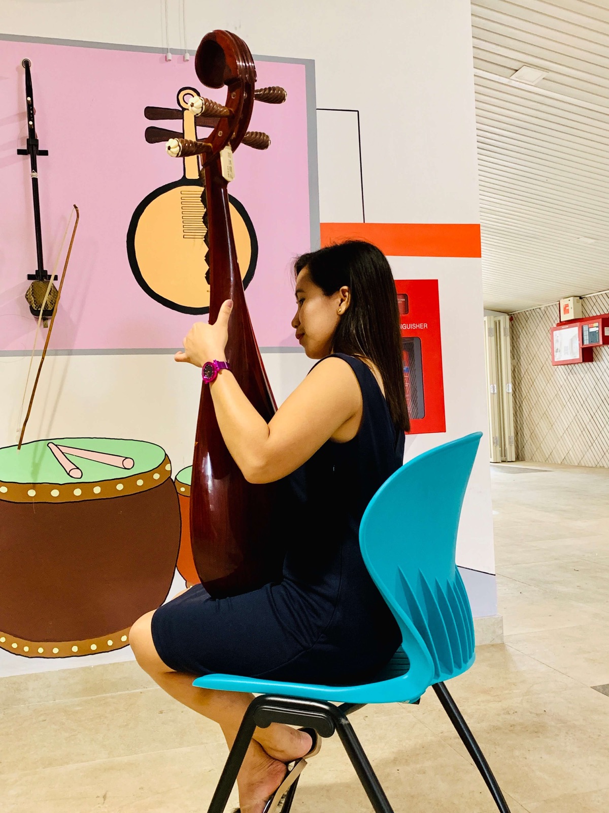 Student practising pipa for a DSA Chinese orchestra audition in Singapore
